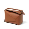 Puzzle Edge Bag in Tan sold by MARAIS