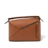 Puzzle Edge Bag in Tan sold by MARAIS