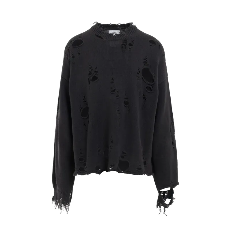 Destroyed Knit Pullover in Black sold by MARAIS