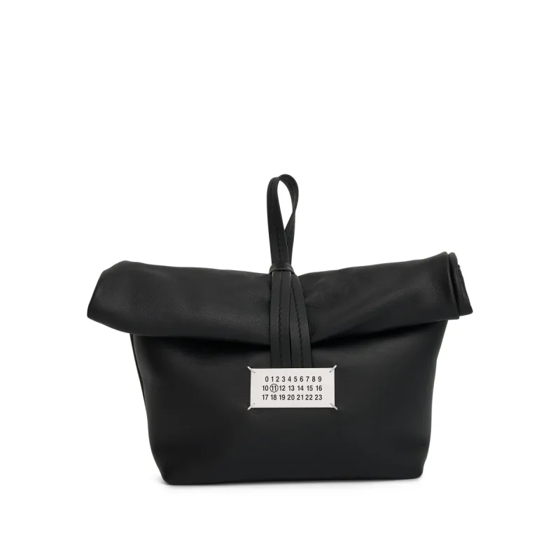 Leather Clutch Bag in Black sold by MARAIS