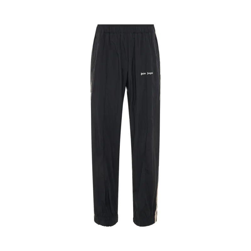 Logo Nylon Track Pants in Black sold by MARAIS