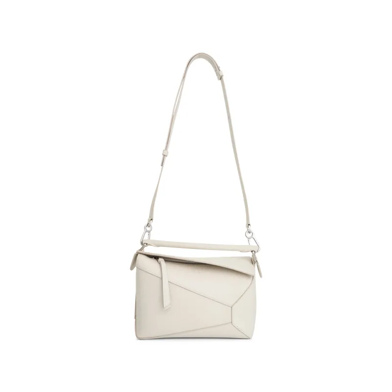 Small Puzzle Edge Bag in Soft White sold by MARAIS