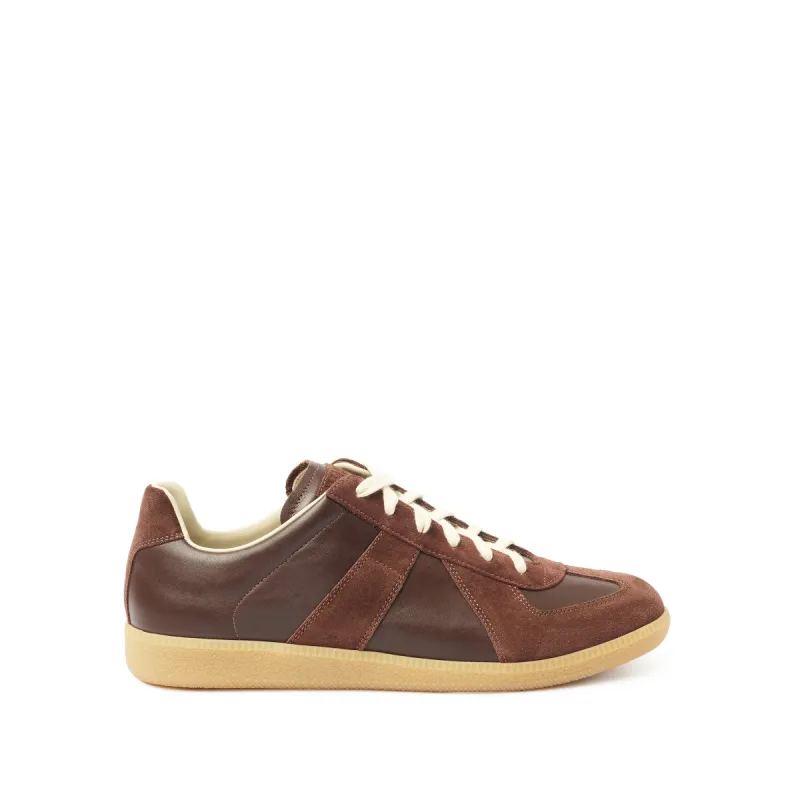 Replica Leather Sneaker in Chic Brown sold by MARAIS