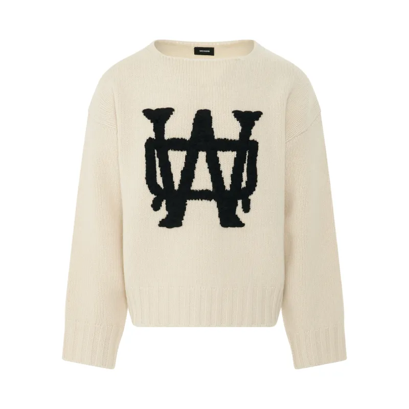 Hand Embroidered Knit sweater in Ivory sold by MARAIS