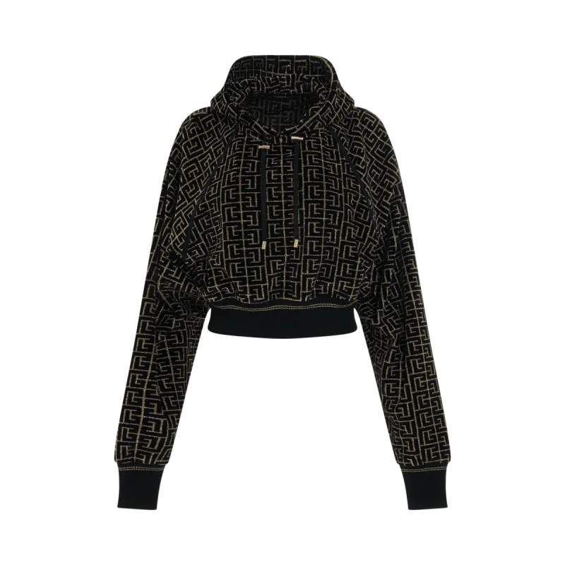 Monogram Velvet Jacquard Cropped Hoodie in Black/Gold made by MARAIS