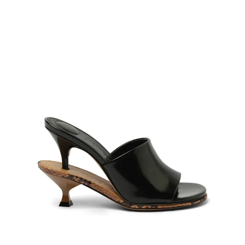 Les Doubles Mules in Black/Light Brown sold by MARAIS