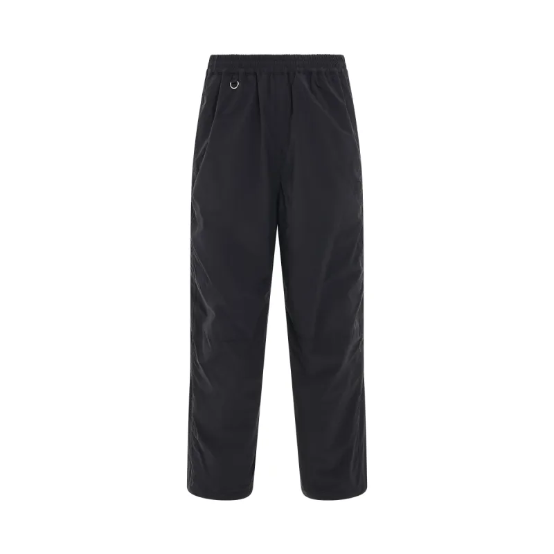 Chaos Embroidery Track Pants in Black sold by MARAIS