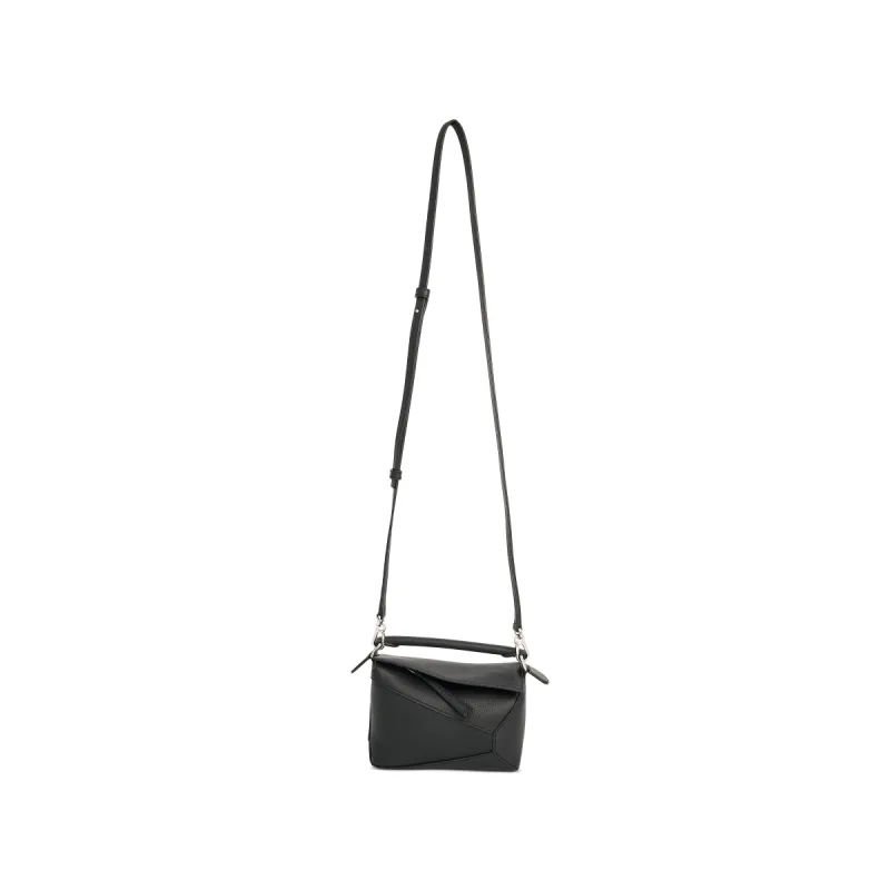 Mini Puzzle Edge Bag in Black sold by MARAIS