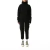 Fisherman Tabard Sweater in Black sold by MARAIS
