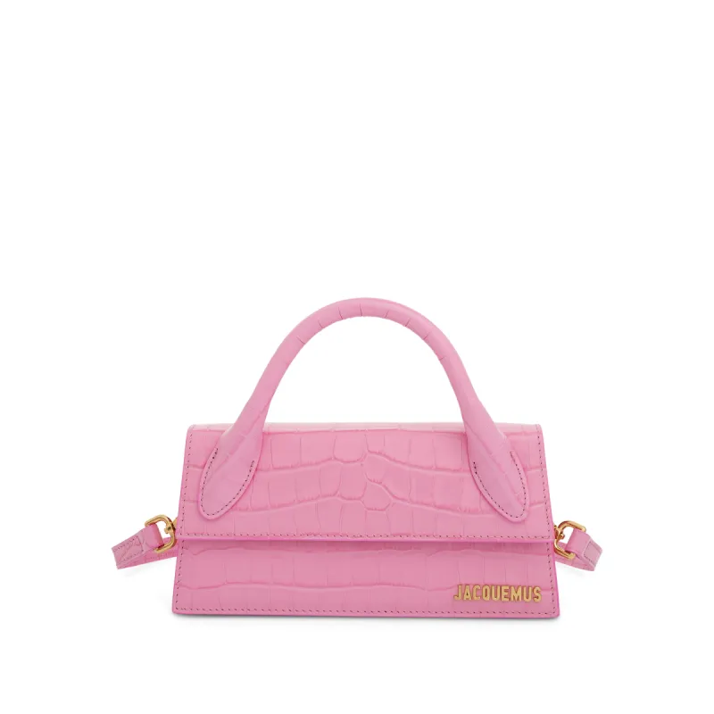 Le Chiquito Long Croc Embossed Leather Bag in Pink sold by MARAIS