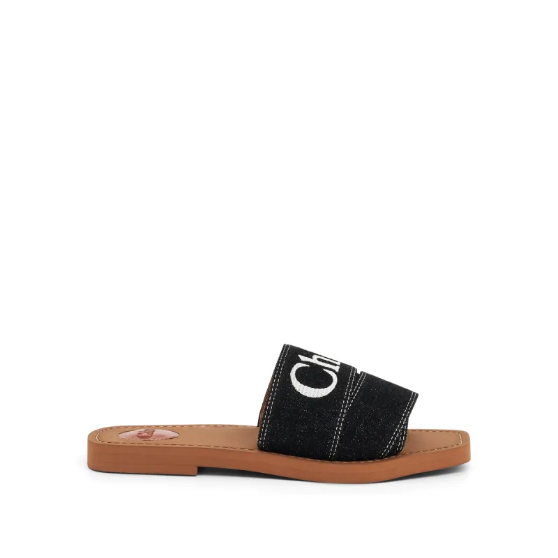 Woody Flat Mule in Black made by MARAIS