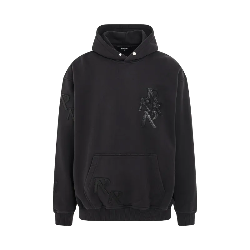Applique Initial Hoodie in Faded Black sold by MARAIS