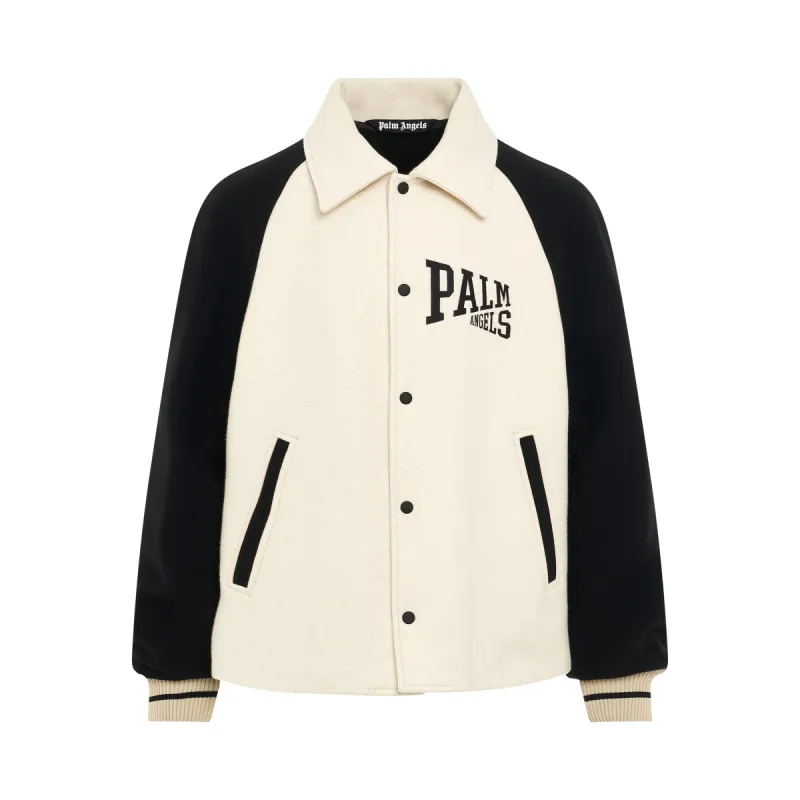 University Slogan Varsity Jacket in Butter/Black sold by MARAIS