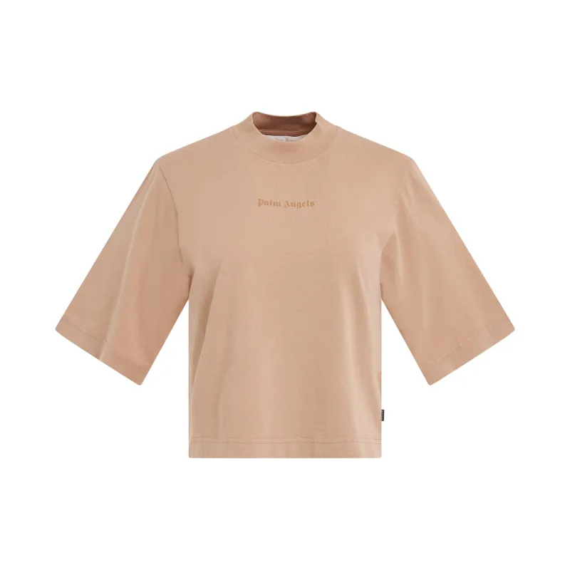 GD Reversed Logo Cropped T-Shirt in Beige sold by MARAIS