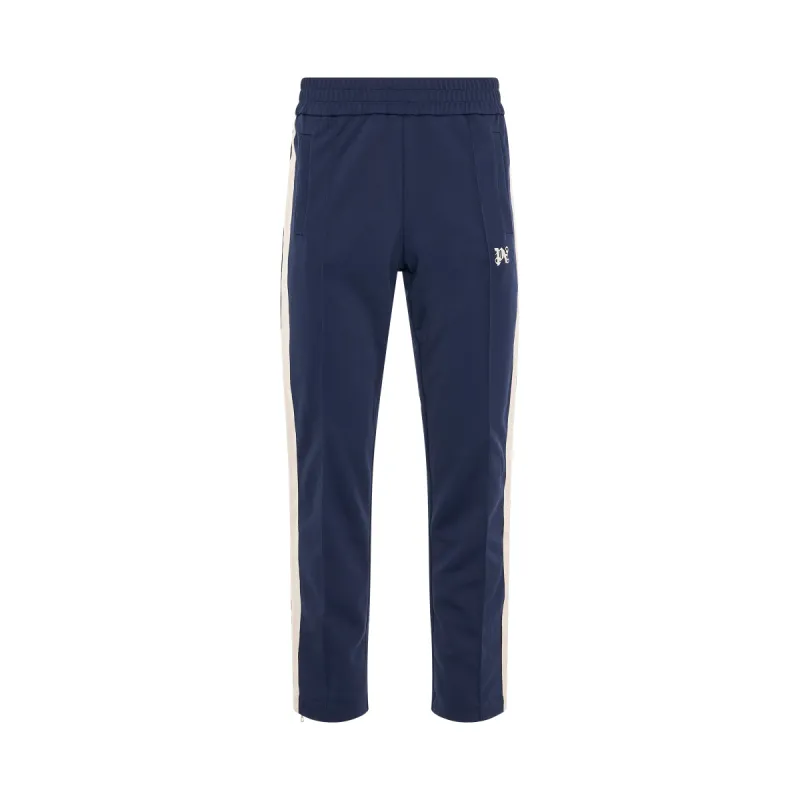 Monogram Embroidered Track Pants in Navy Blue sold by MARAIS