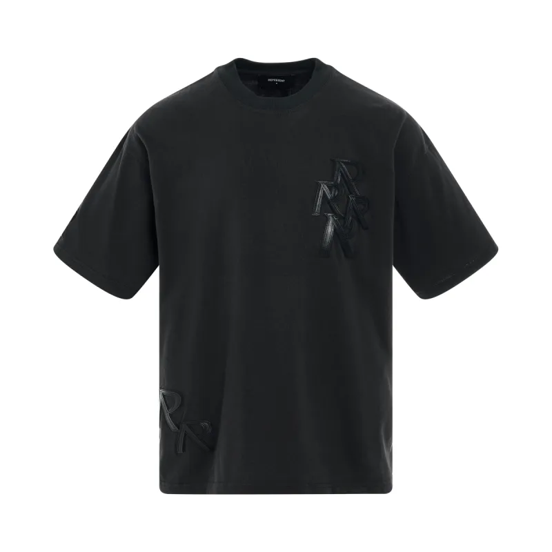 Applique Initial T-Shirt in Faded Black sold by MARAIS