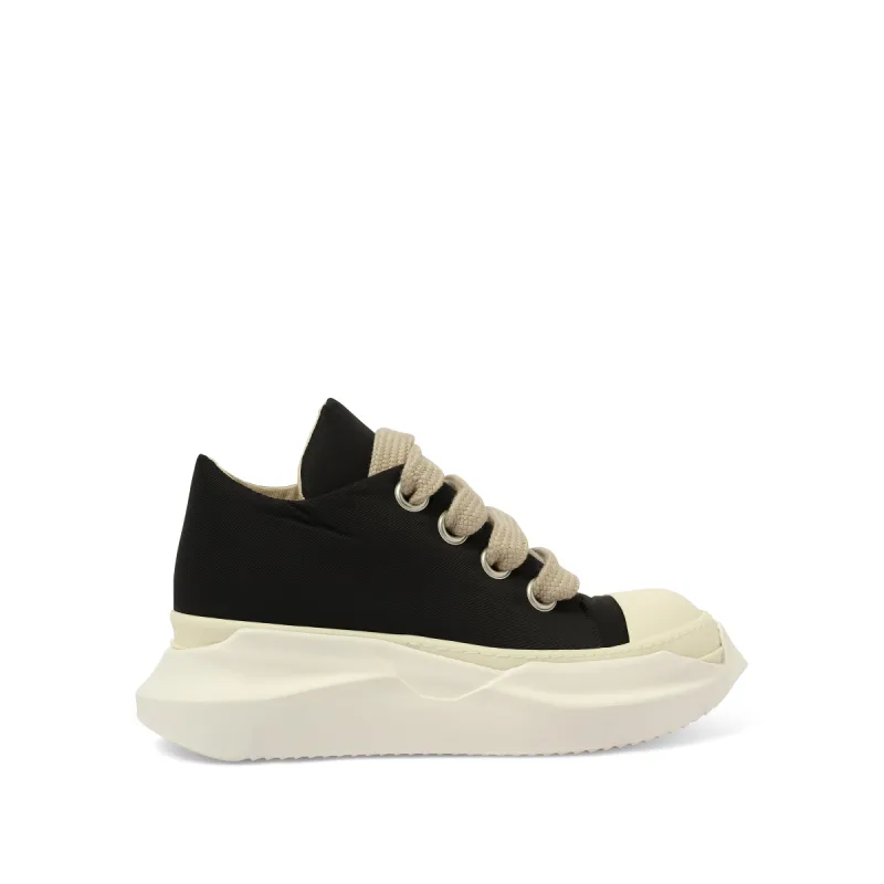 Jumbo Lace Abstract Low Sneaks in Black/Pearl sold by MARAIS