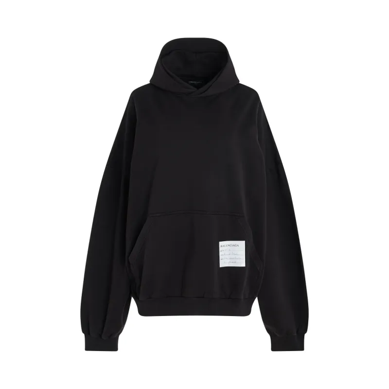 Sample Sticker Round Hoodie in Charcoal sold by MARAIS