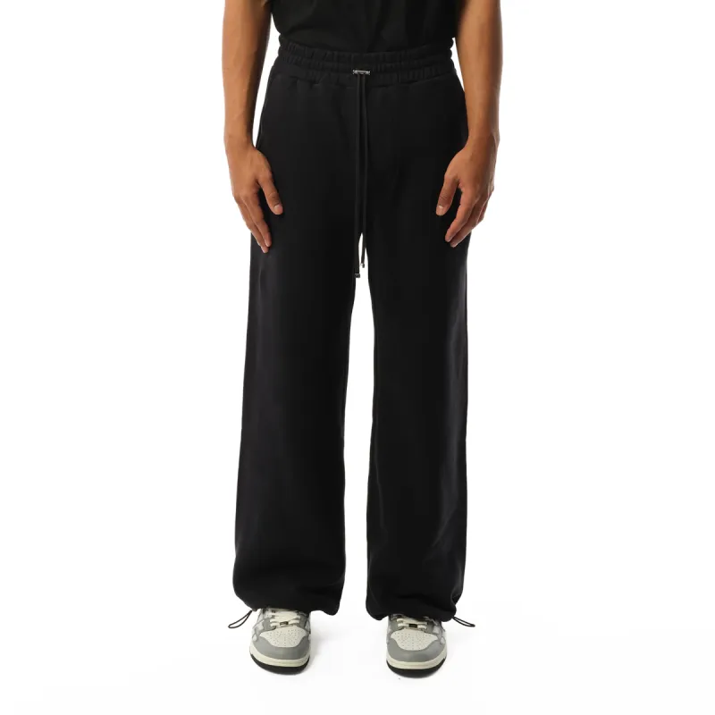 Amiri Oversized Sweatpants in Black sold by MARAIS