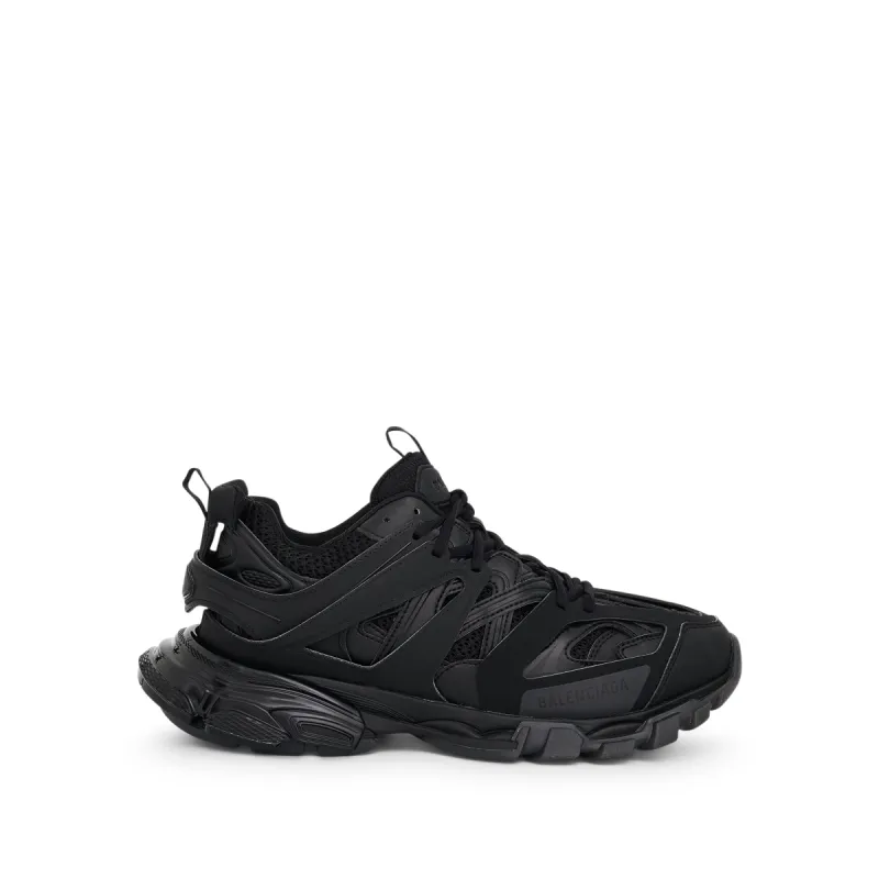 Track Clear Sole Sneaker in Black sold by MARAIS