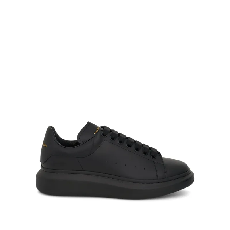 Larry Oversized Rubber Sneaker in Black made by Alexander McQueen