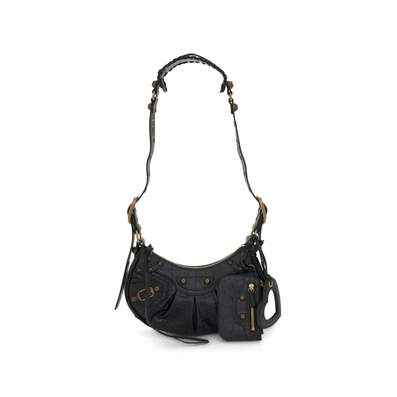 Le Cagole Embossed Croco Shoulder Bag XS in Black sold by MARAIS