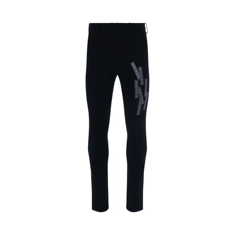 Stretching Tape Trousers in Black sold by MARAIS