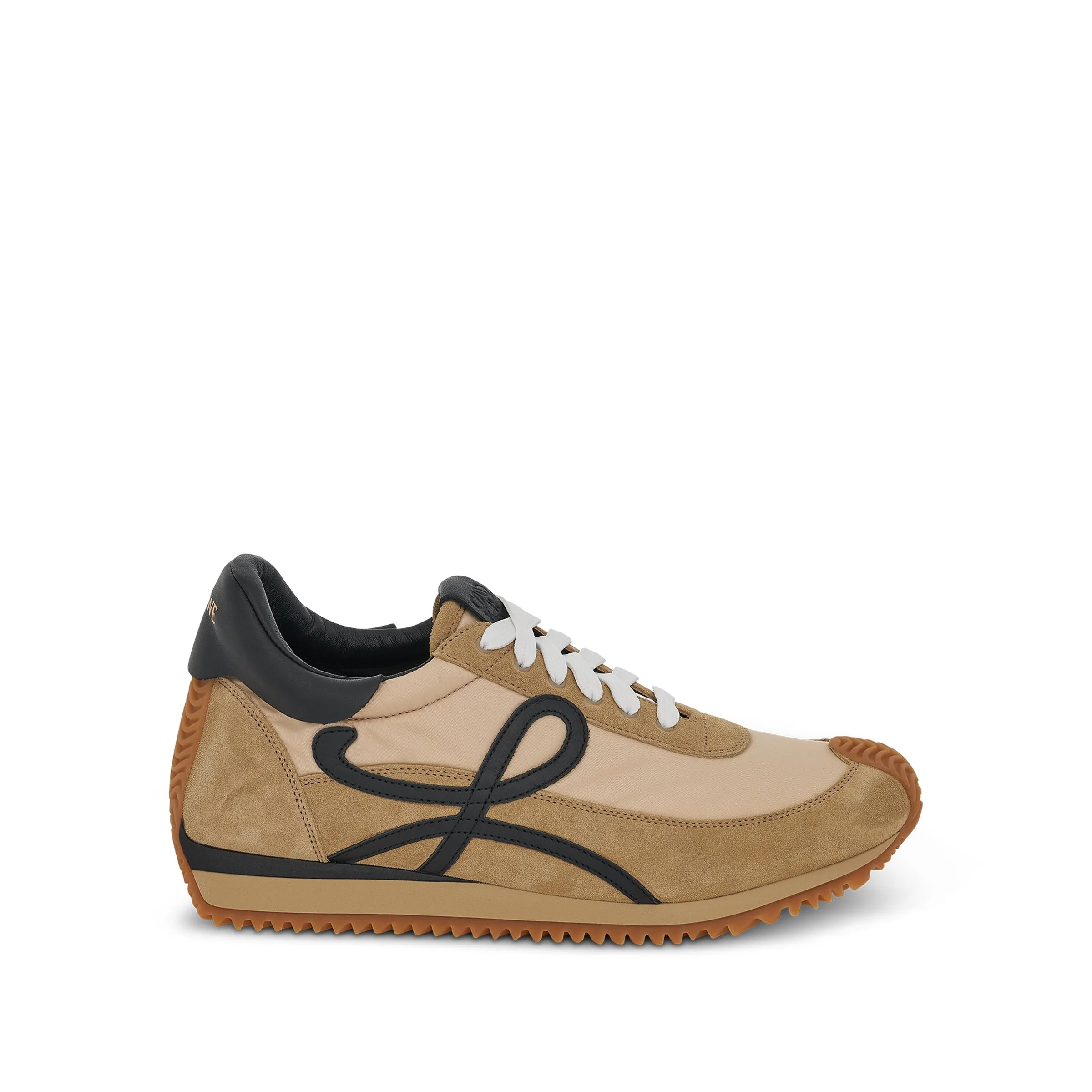 Loewe Flow Runner Sneaker in Gold sold by MARAIS