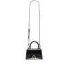 Hourglass XS Handbag in Box Calfskin in Black sold by MARAIS