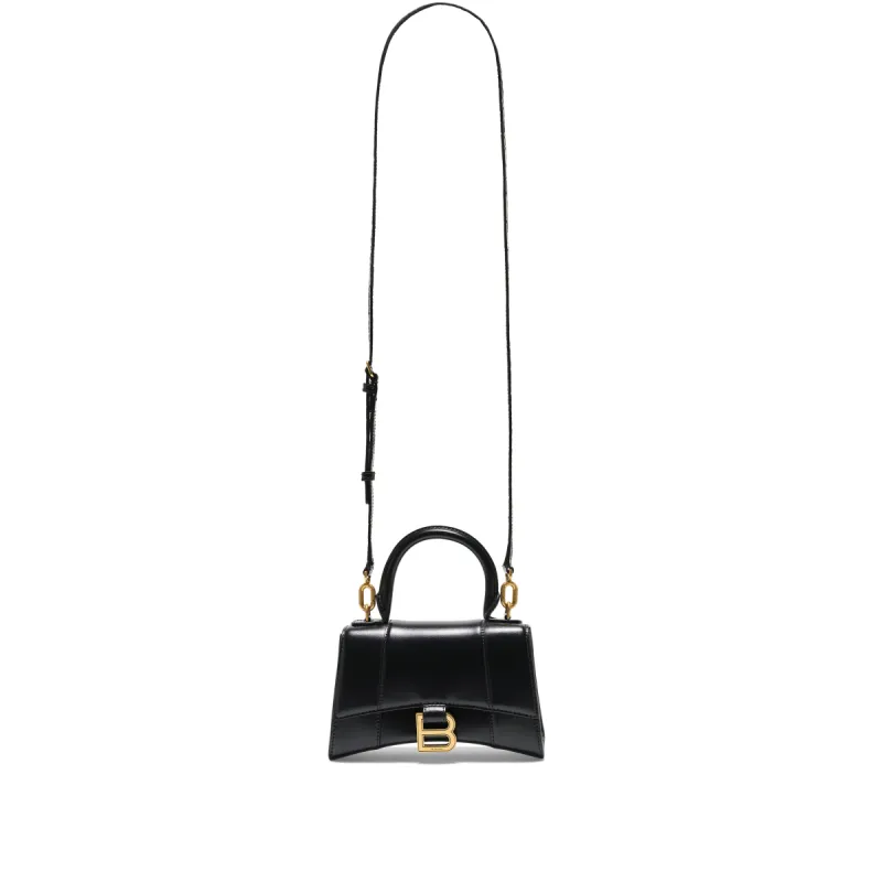 Hourglass XS Handbag in Box Calfskin in Black sold by MARAIS