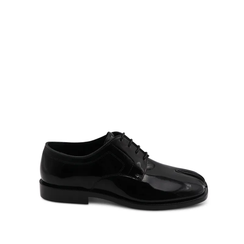 Tabi Lace-ups Shoes in Shine Black sold by MARAIS