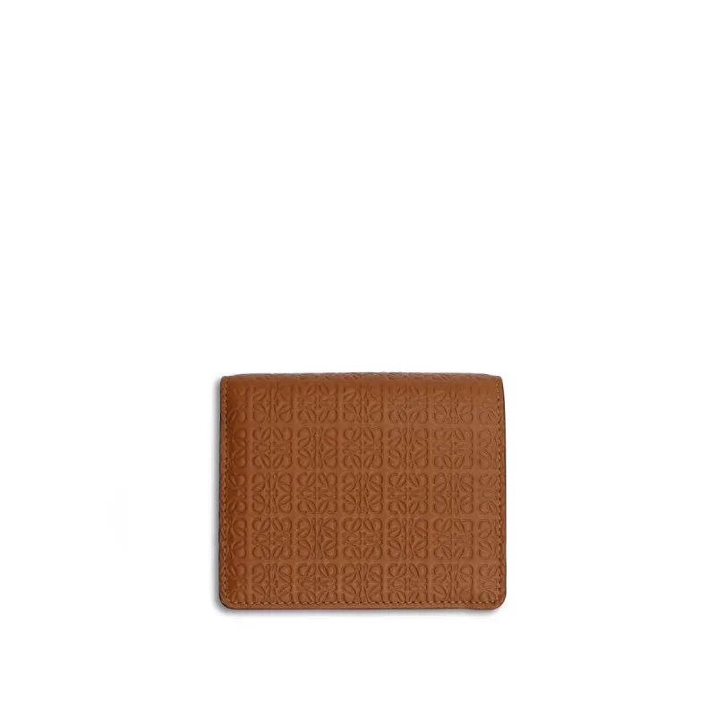 Repeat Compact Zip Wallet in Embossed Calfskin in Tan made by Loewe
