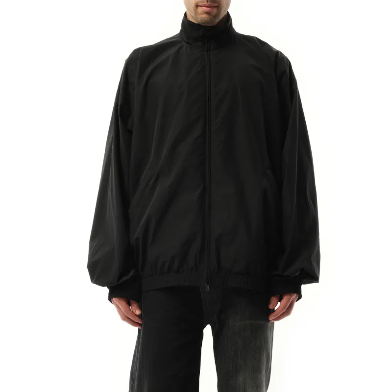 Techno Poplin Tracksuit Jacket in Black sold by MARAIS