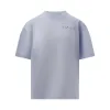 Embossed Logo T-Shirt in Illusion Blue sold by MARAIS