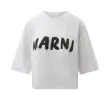 Cropped Logo T-Shirt in Lily White sold by MARAIS