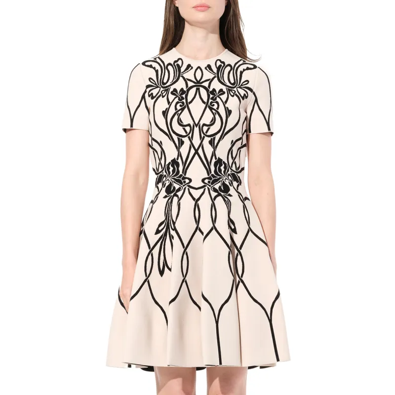 Volume Mini Dress in Black sold by MARAIS