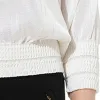 Sweater in White sold by MARAIS