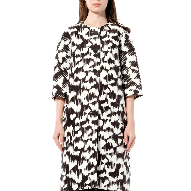 Coat in Black/White sold by MARAIS