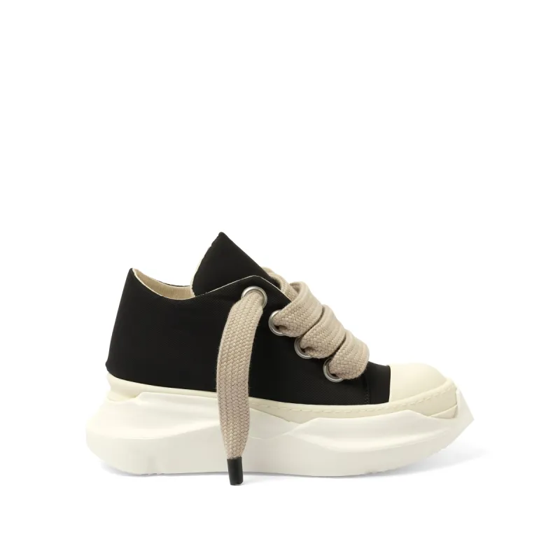 Jumbo Laced Abstract Low Sneaks in Black/Pearl sold by MARAIS