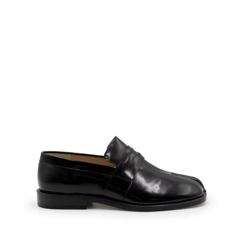 Tabi Loafers in Black sold by MARAIS