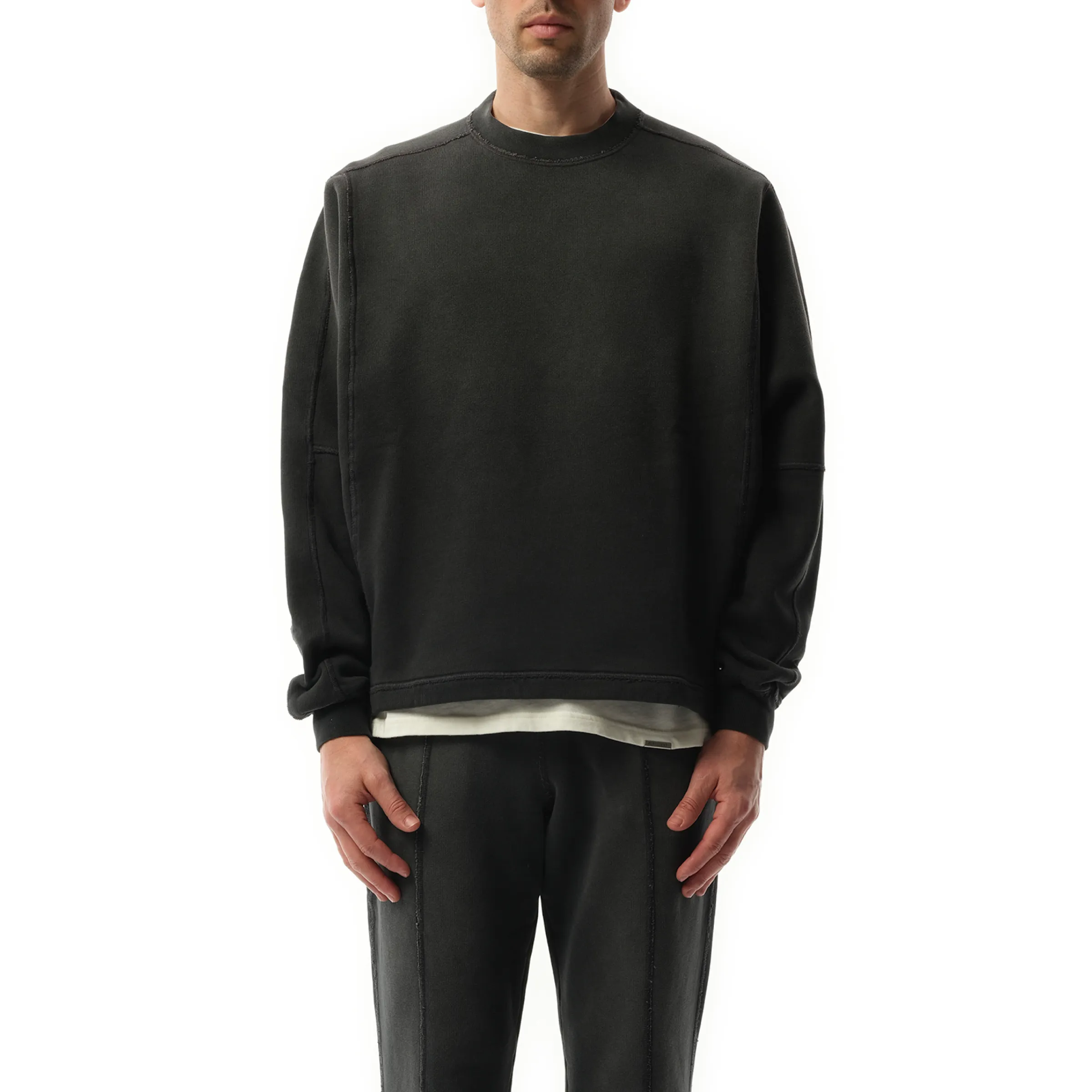 Step Hem Sweatshirt in Stained Black sold by MARAIS