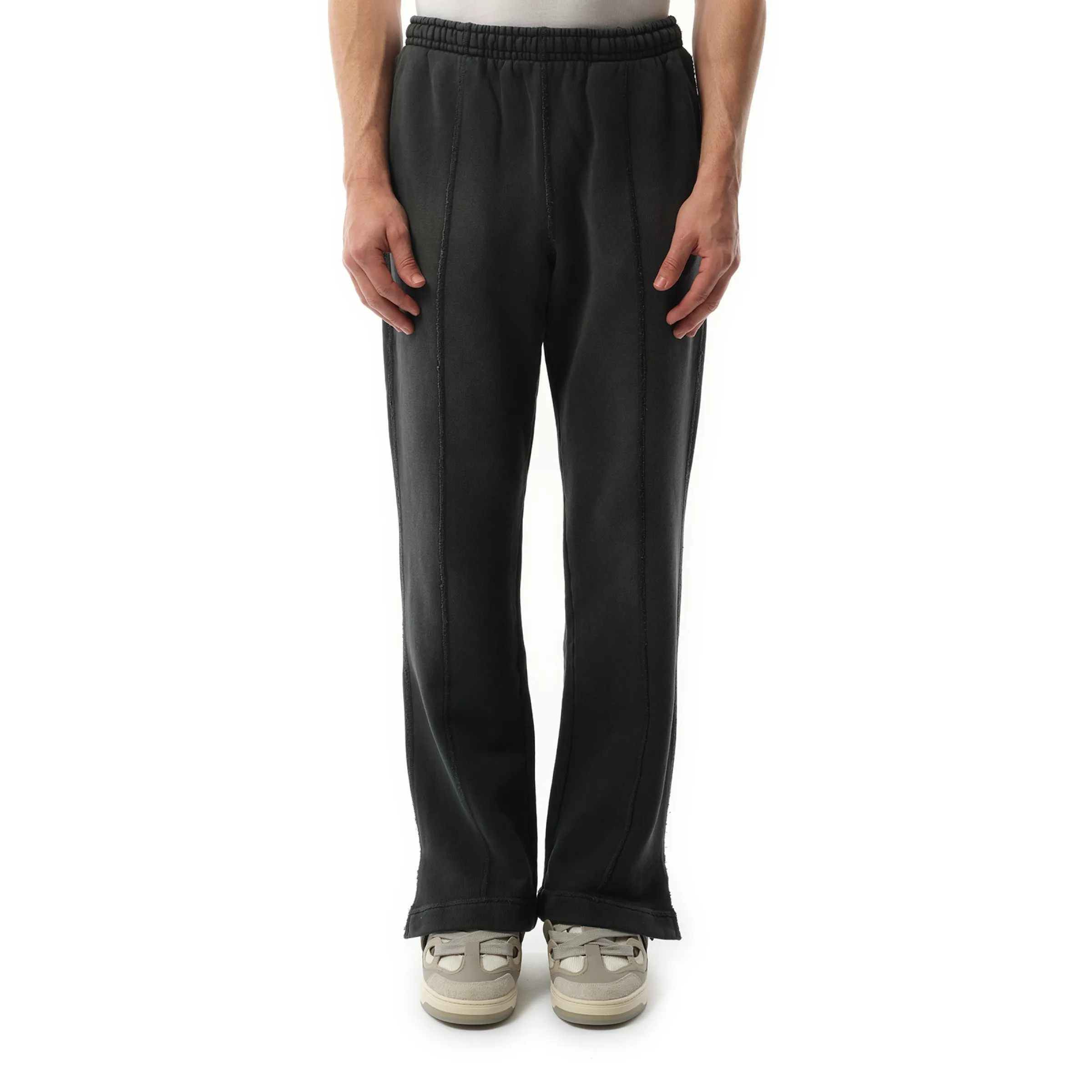 Step Hem Sweatpants in Stained Black sold by MARAIS
