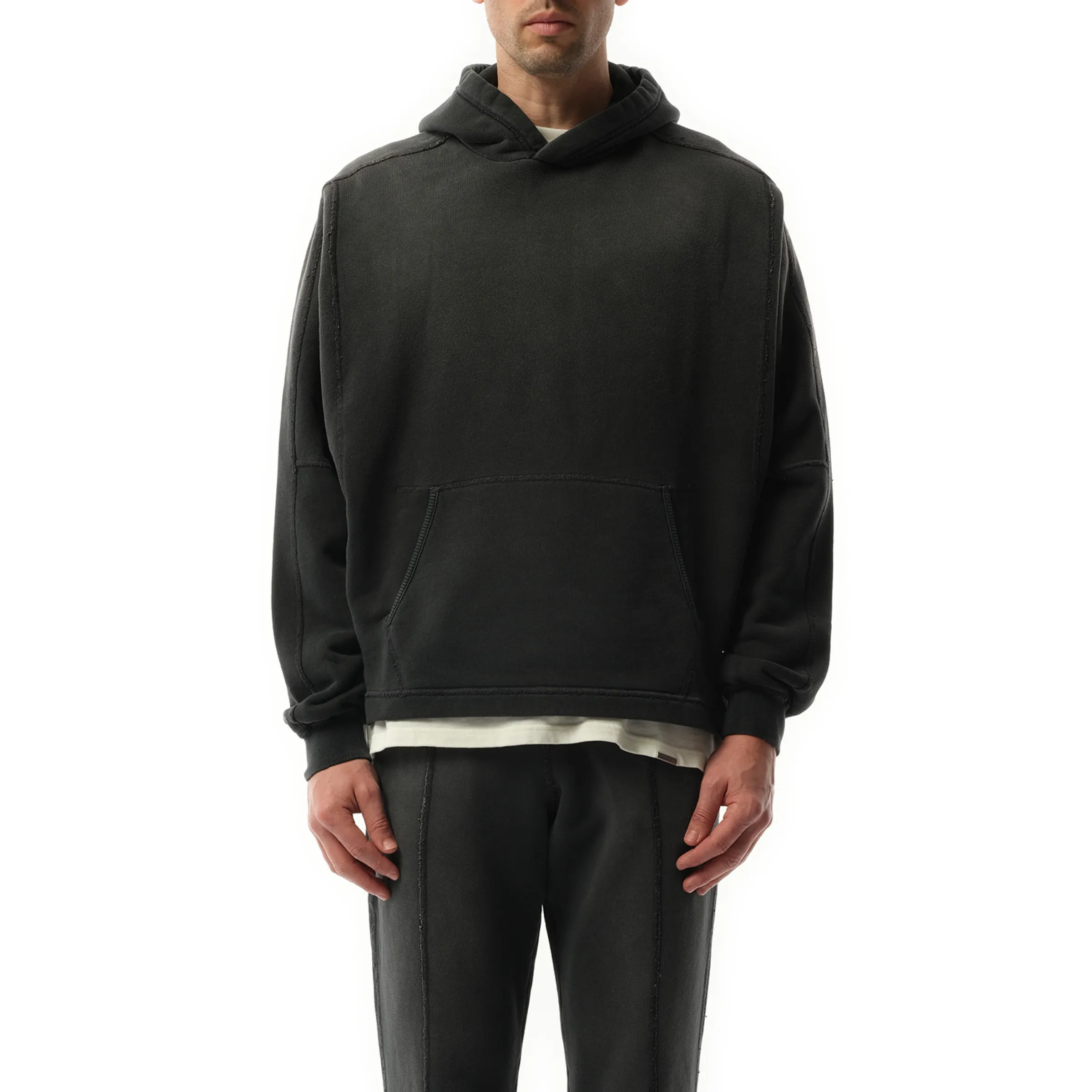 Step Hem Hoodie in Stained Black sold by MARAIS