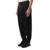 Pleated Tapered Pants in Black sold by MARAIS