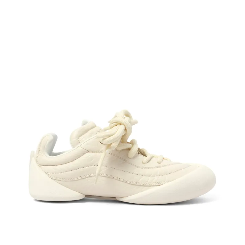 Flexion Sneaker in Off White sold by MARAIS