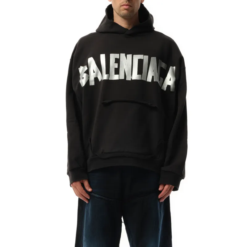 Tape Type Ripped Pocket Hoodie in Faded Black sold by MARAIS