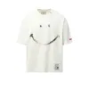 Smily Face Printed T-Shirt in White sold by MARAIS