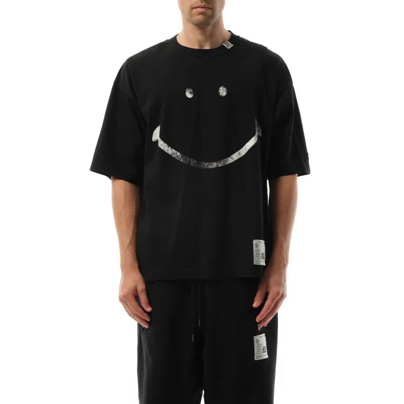 Smily Face Printed T-Shirt in Black sold by MARAIS