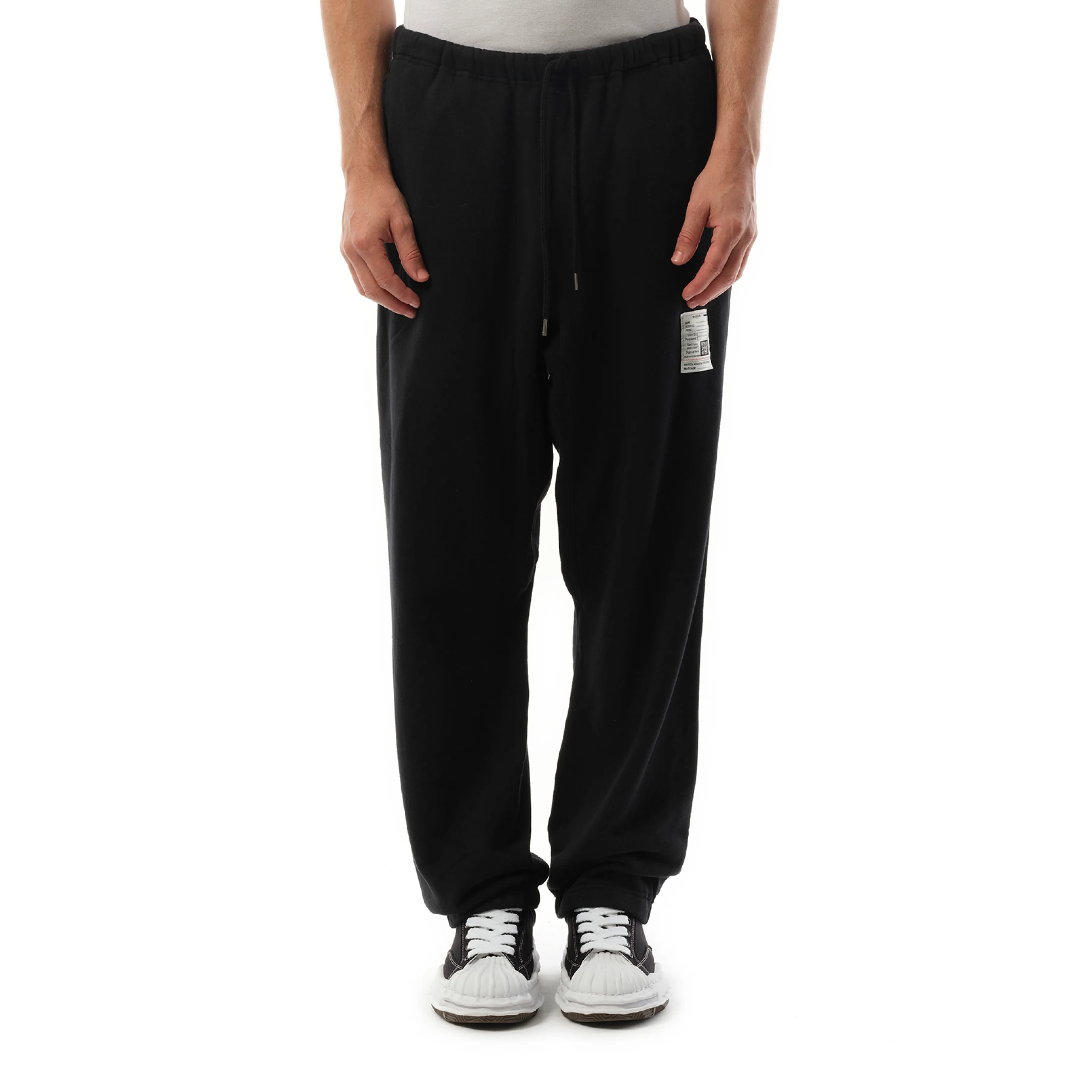 Distressed Sweatpants in Black sold by MARAIS