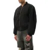 Curved Bomber Jacket in Black sold by MARAIS